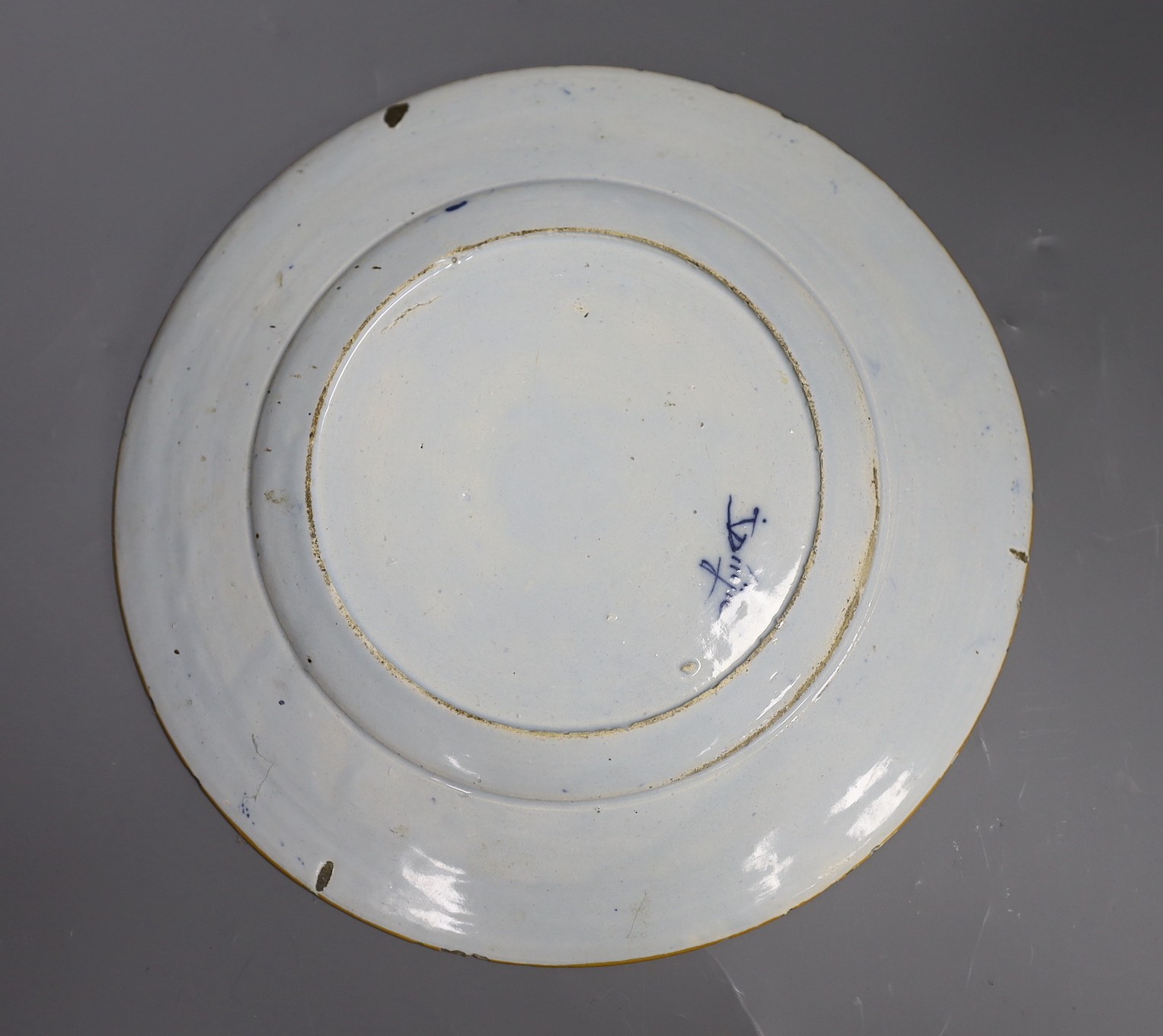 A Delft blue and white inscribed marriage plate, dated 1779, 25cm